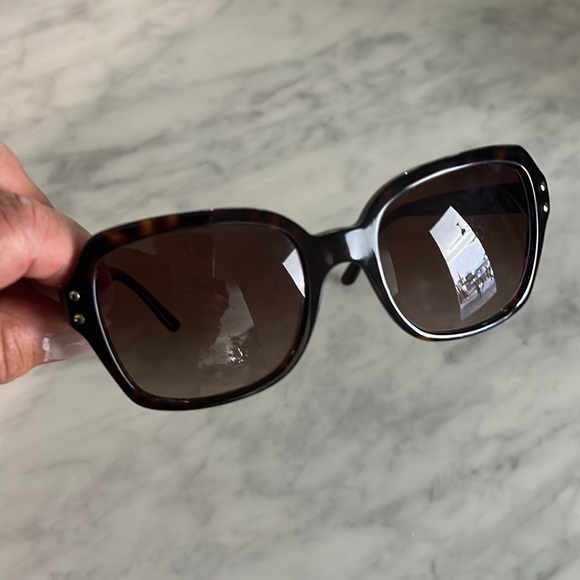 Tory Burch sunglasses like new.. tortoiseshell color go with everything